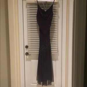 Xscape sequinened evening gown in eggplant color